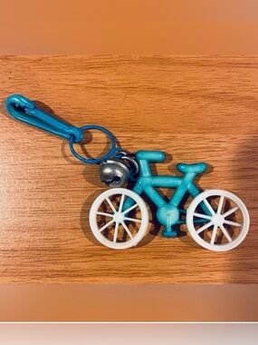 Vintage 1980s Plastic Bell Charm Bike Bicycle Wheels Move 80s Necklace Blue
